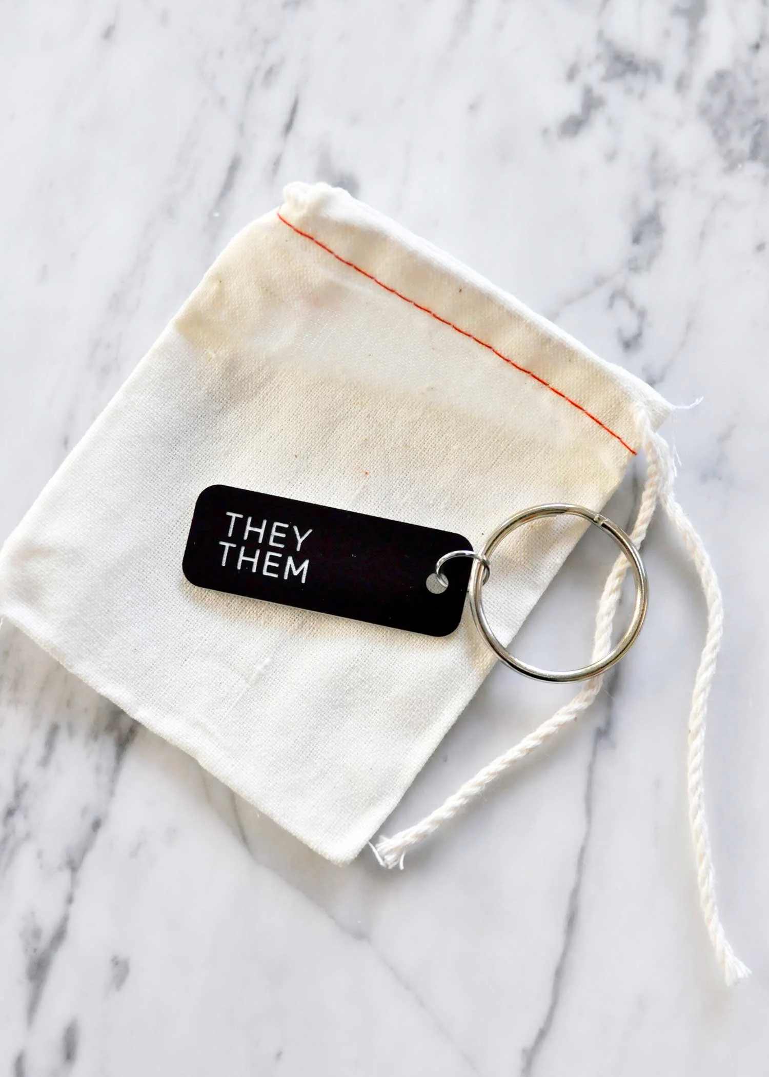 swellmadeco-they-them-keytag.jpg