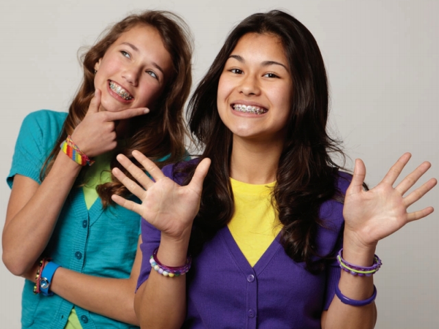 Traditional Metal Braces - Made of high grade stainless steel, it is the most common type of braces and more comfortable than ever before. With metal braces, you have the option of adding colored elastics to personalize your smile. 
