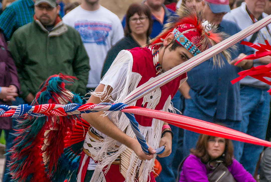 1. This was taken during the San Antonio Cattle Drive, held each year in February. Cattle are herded through the downtown streets of the city. This shot was part of the Native American dances that were held in front of the Alamo.