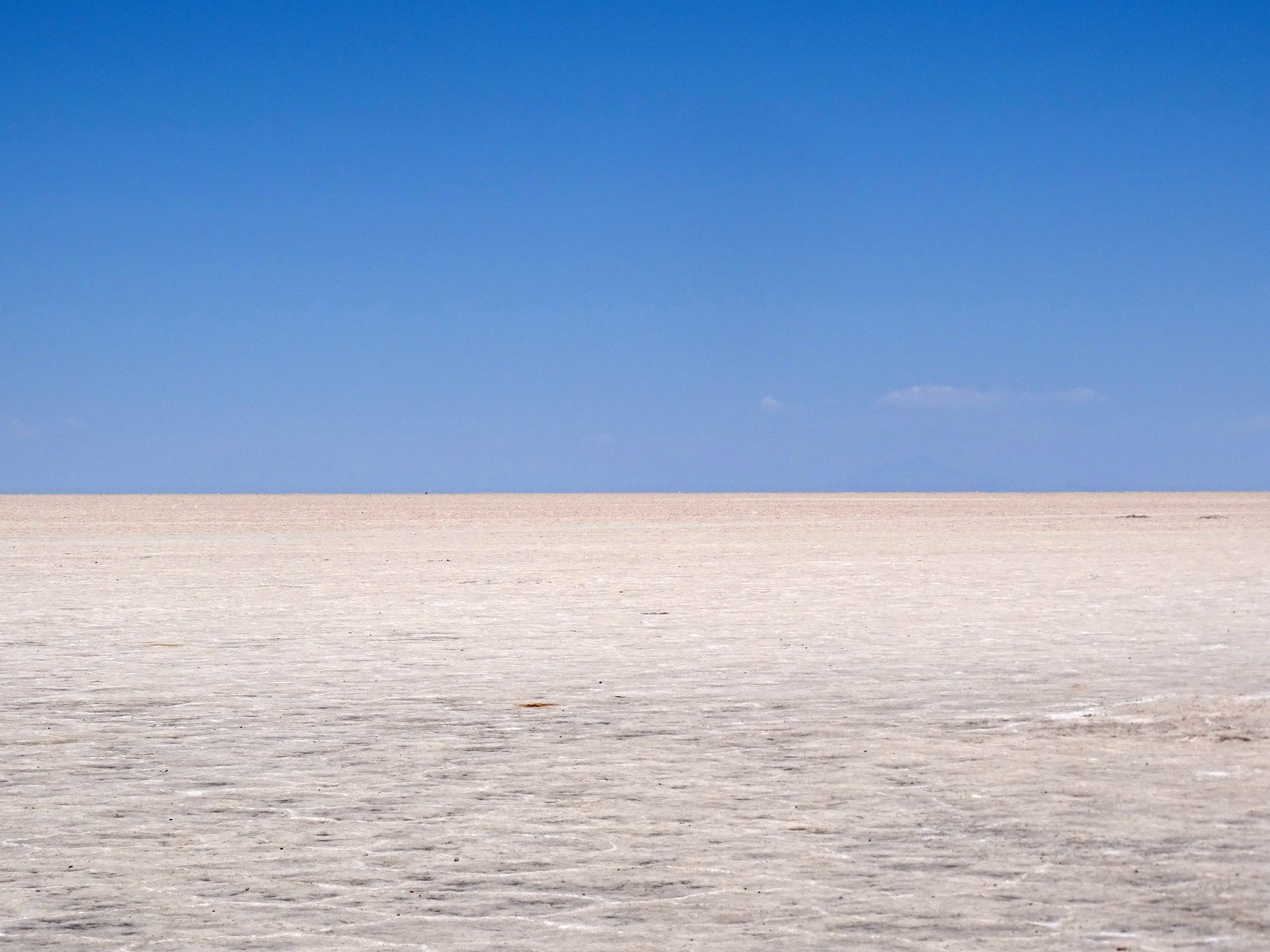 The vast simplicity of the Salar de Uyuni in Bolivia is one of my favorite spots.