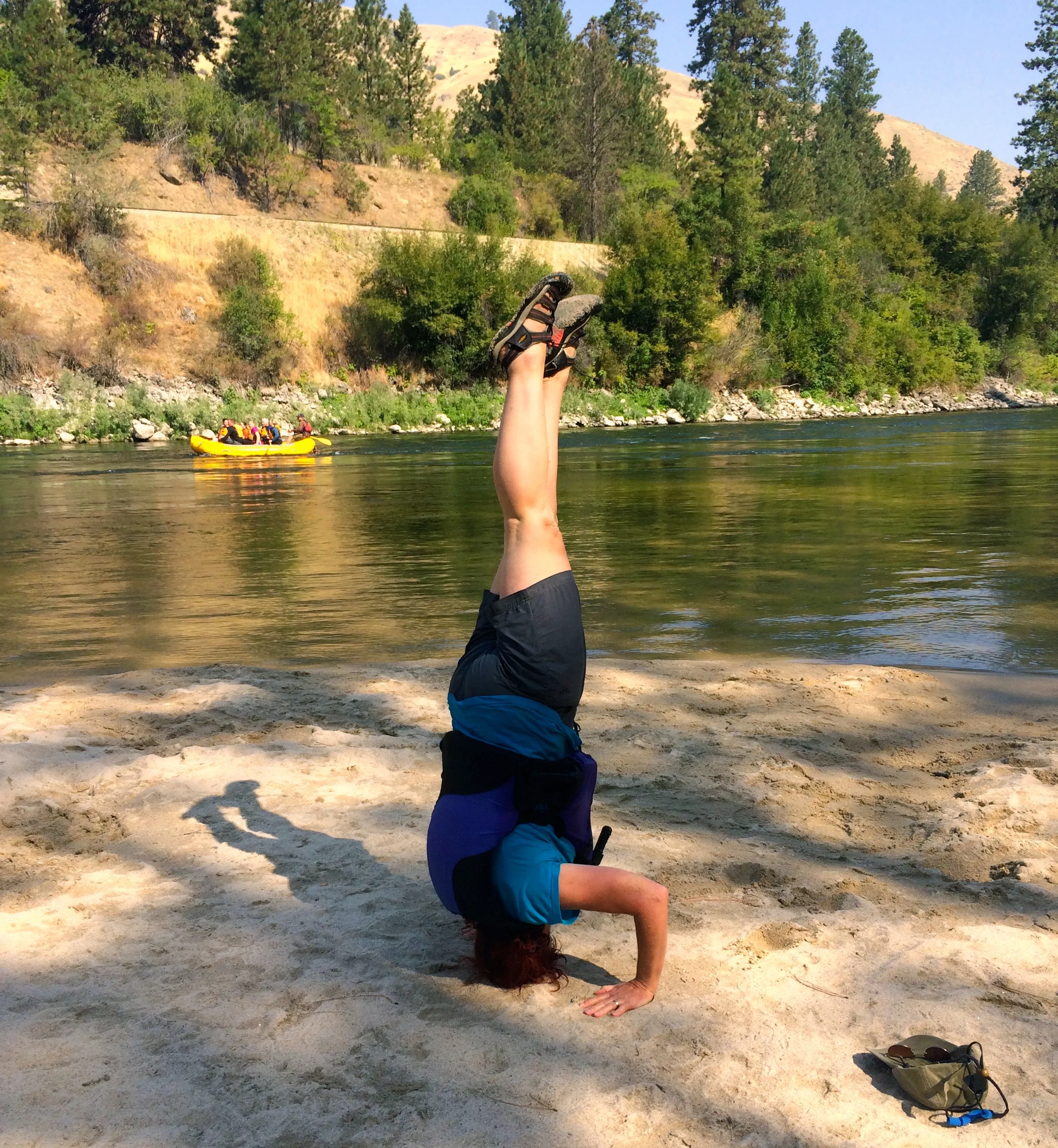 Thanks to yoga, I can accept my brother Doug's dare to stand on my head! It was a great day of rafting near Boise, Idaho.