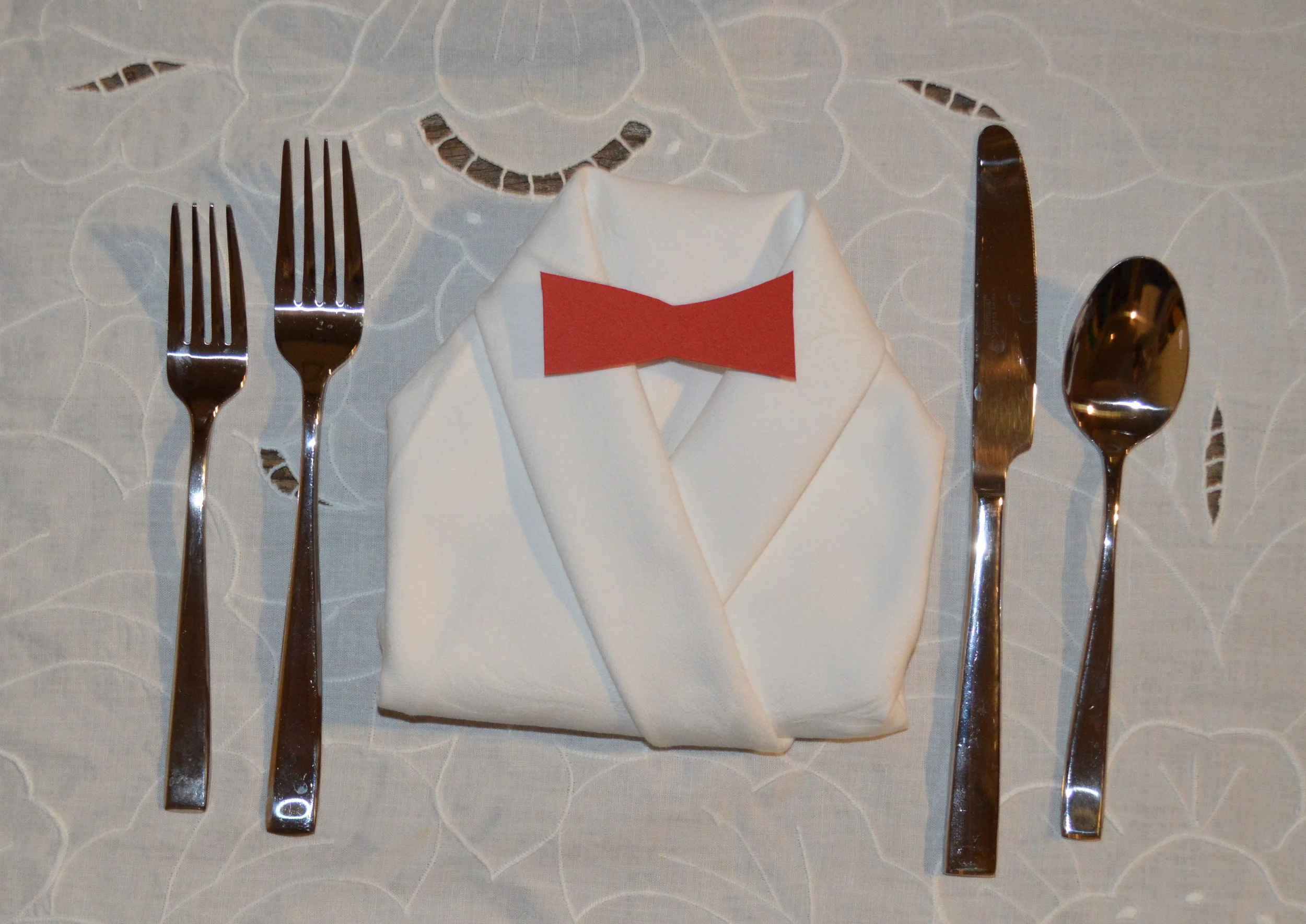 The dress code extended to each place setting.