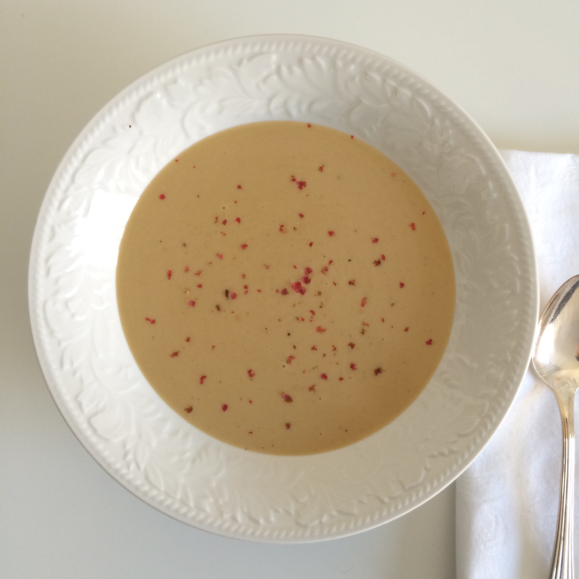 Chilled Vichyssoise Soup with Pink Peppercorns.