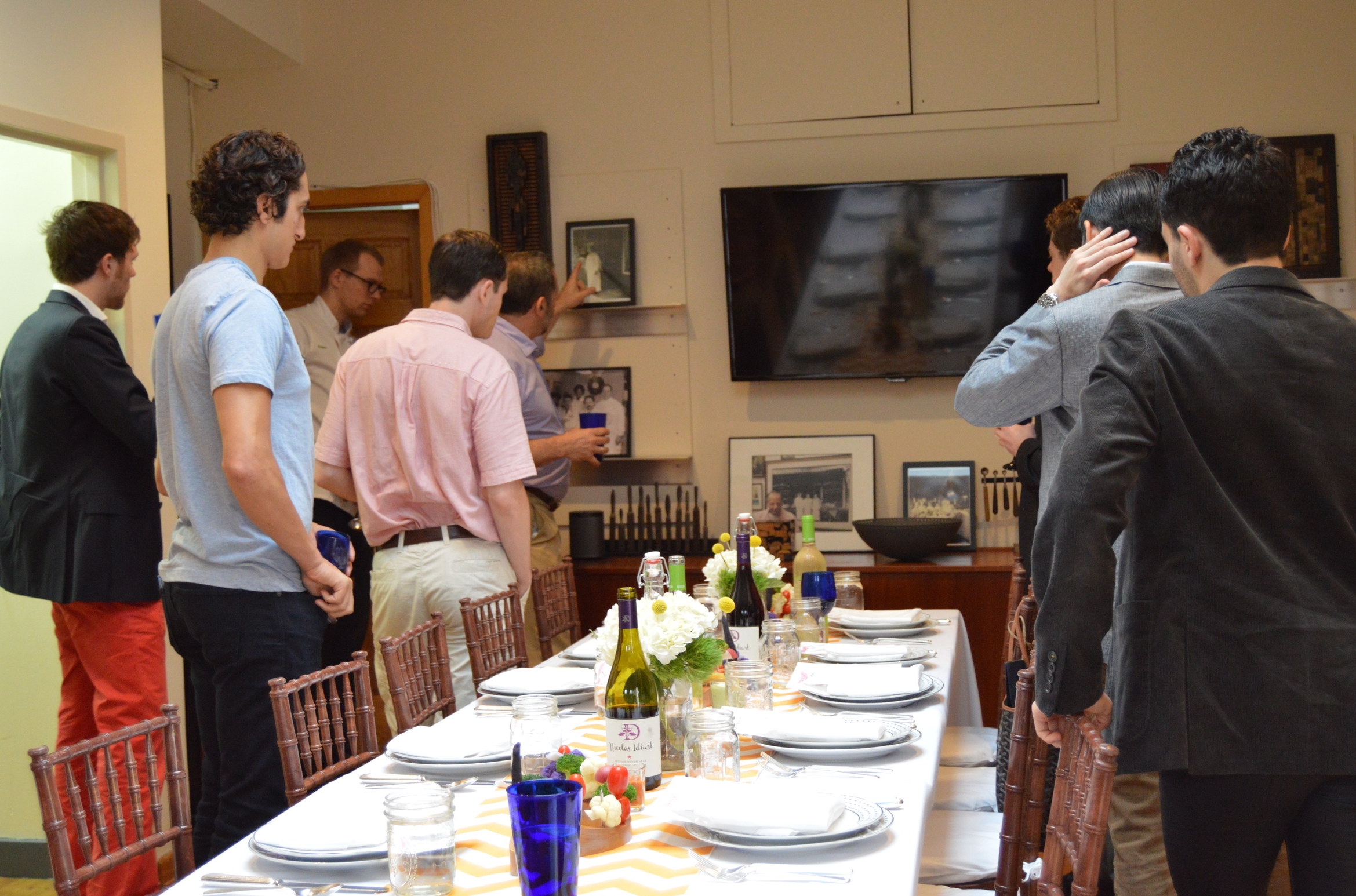 Paul Neuman giving the context around his career, how his family's fish business combined with his passion for making art, led to his creative catering business.