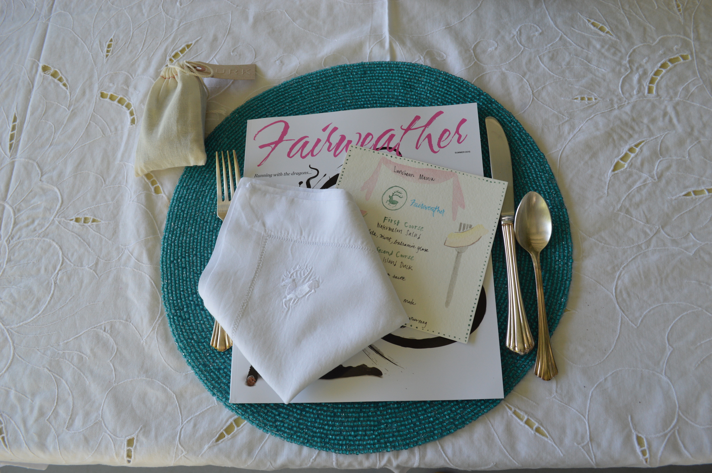 Fairweather 's summer issue, beaded placemats from Kim Seybert , perfume samples from Lurk