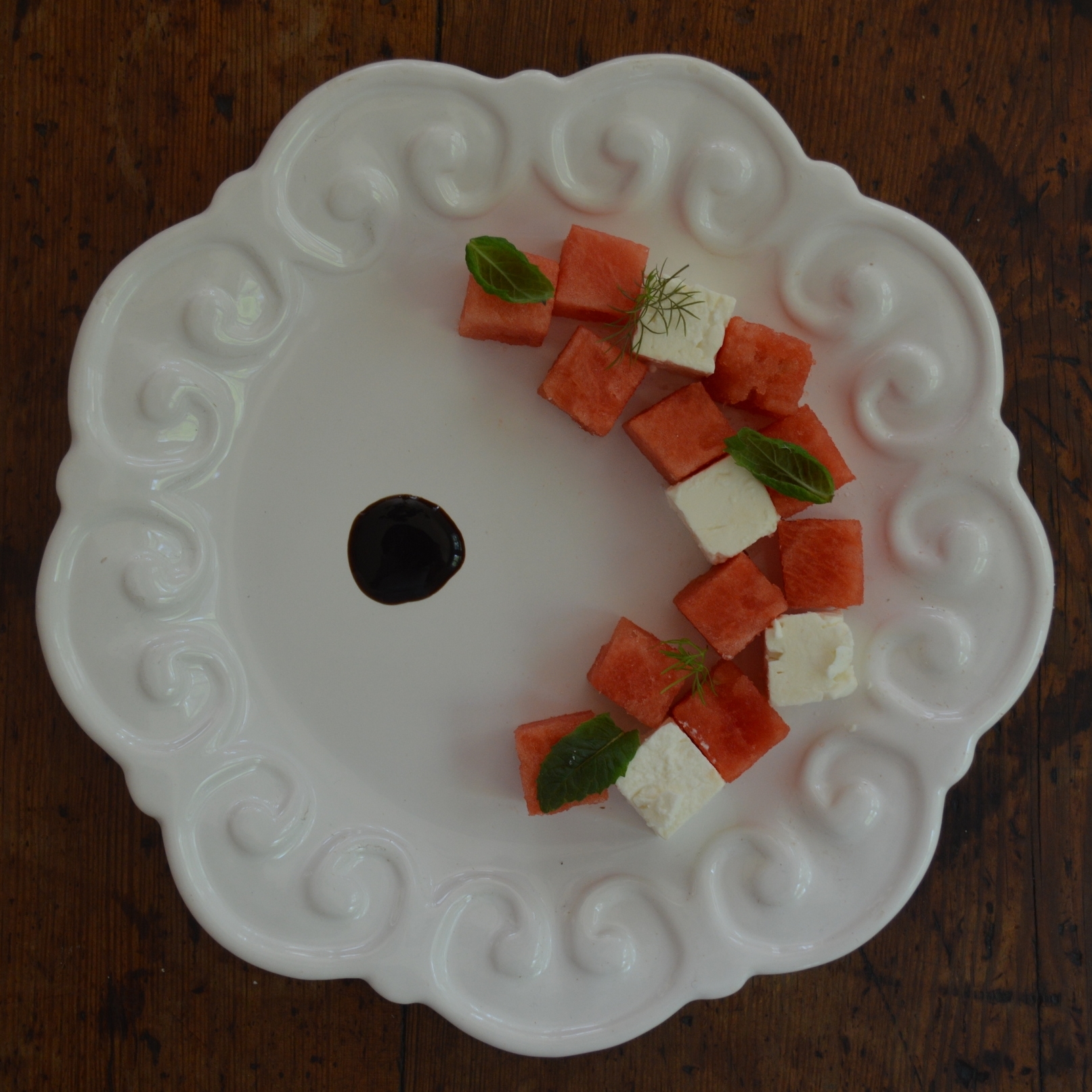 Watermelon salad with feta, balsamic glaze, and microgreens from Good Water Farms