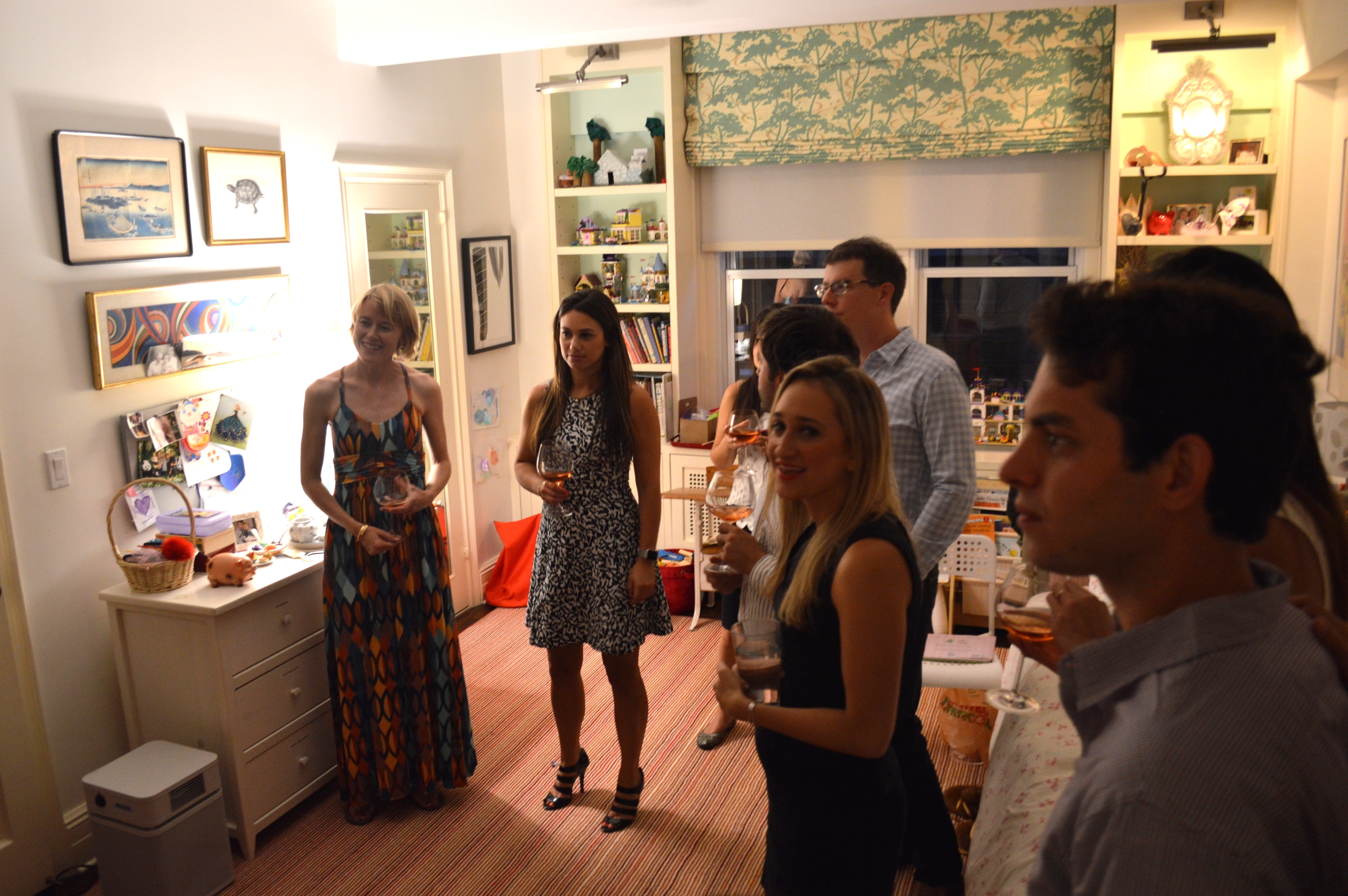 Members and guests learning about the Geary's private art collection at their home in Manhattan