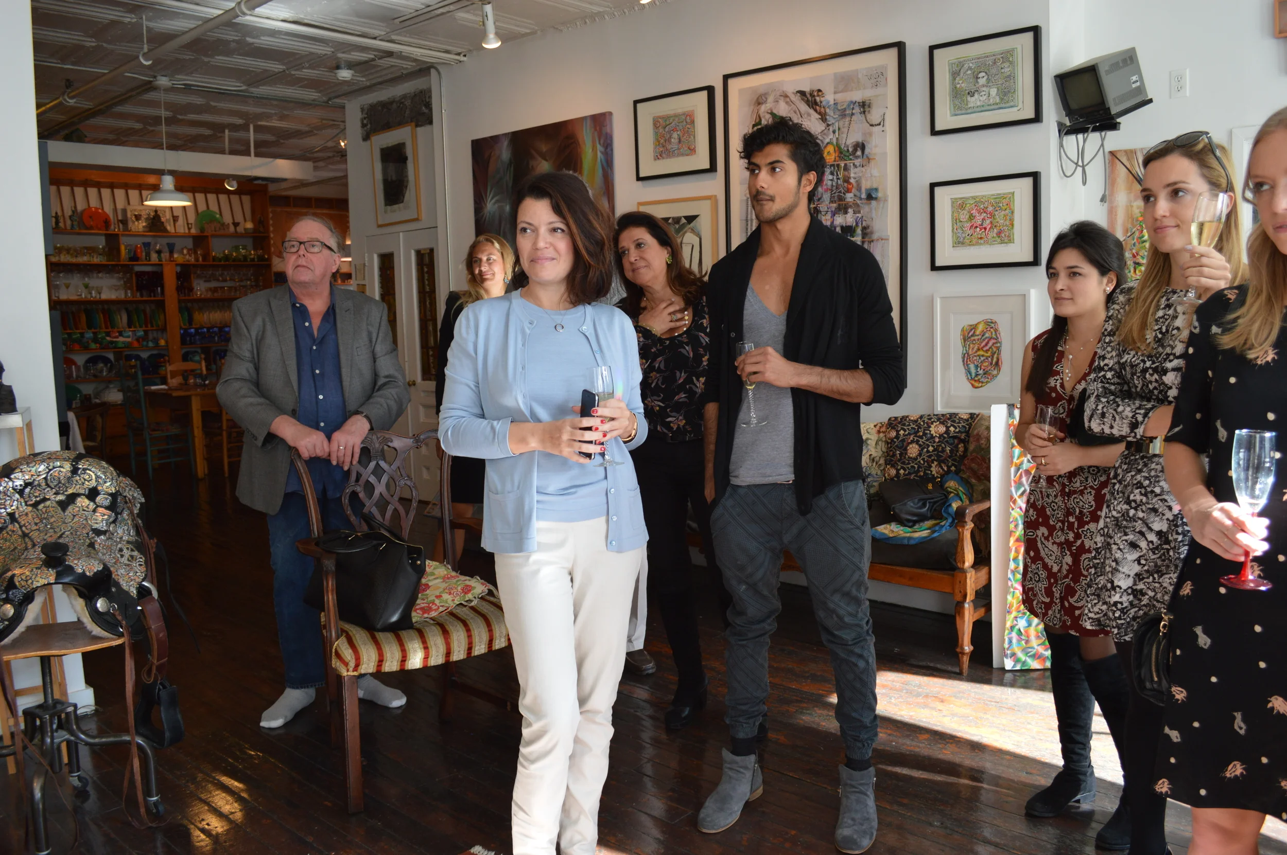 Members and guests learn about Peter's art.
