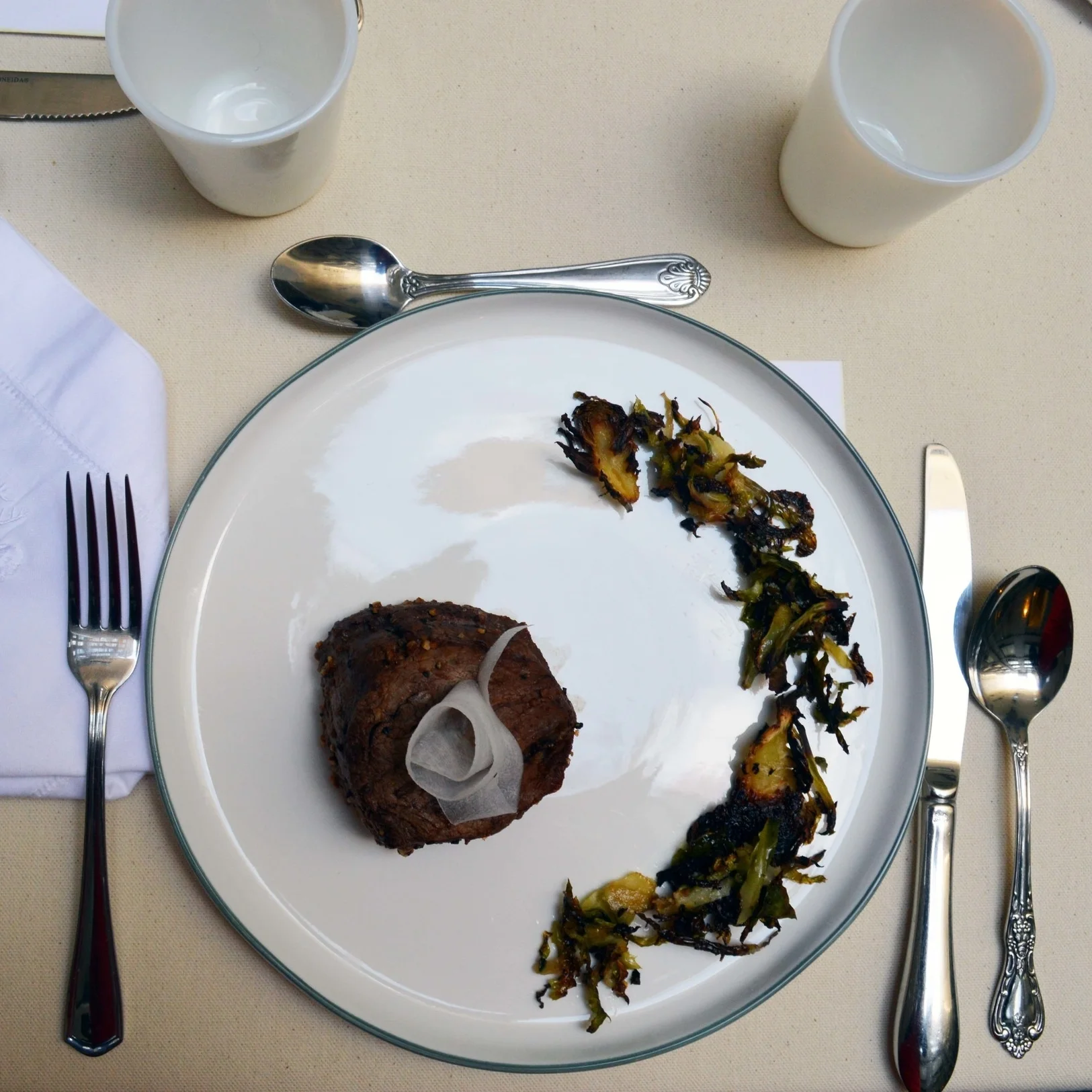 Filet mignon with brussels sprouts.