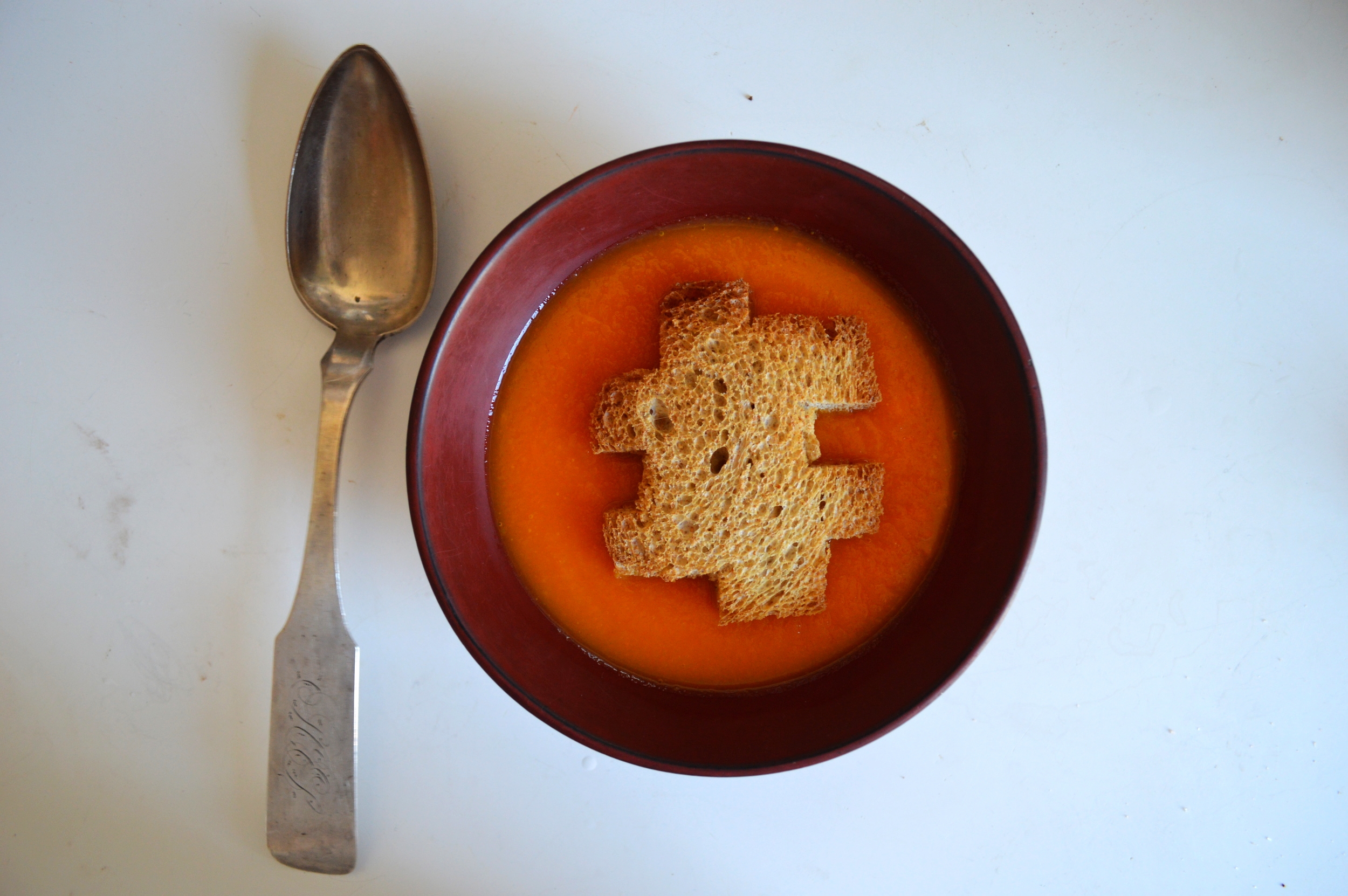 Carrot soup with a puzzle piece garnish, referencing Anastasi's famous "Puzzle Puzzle"