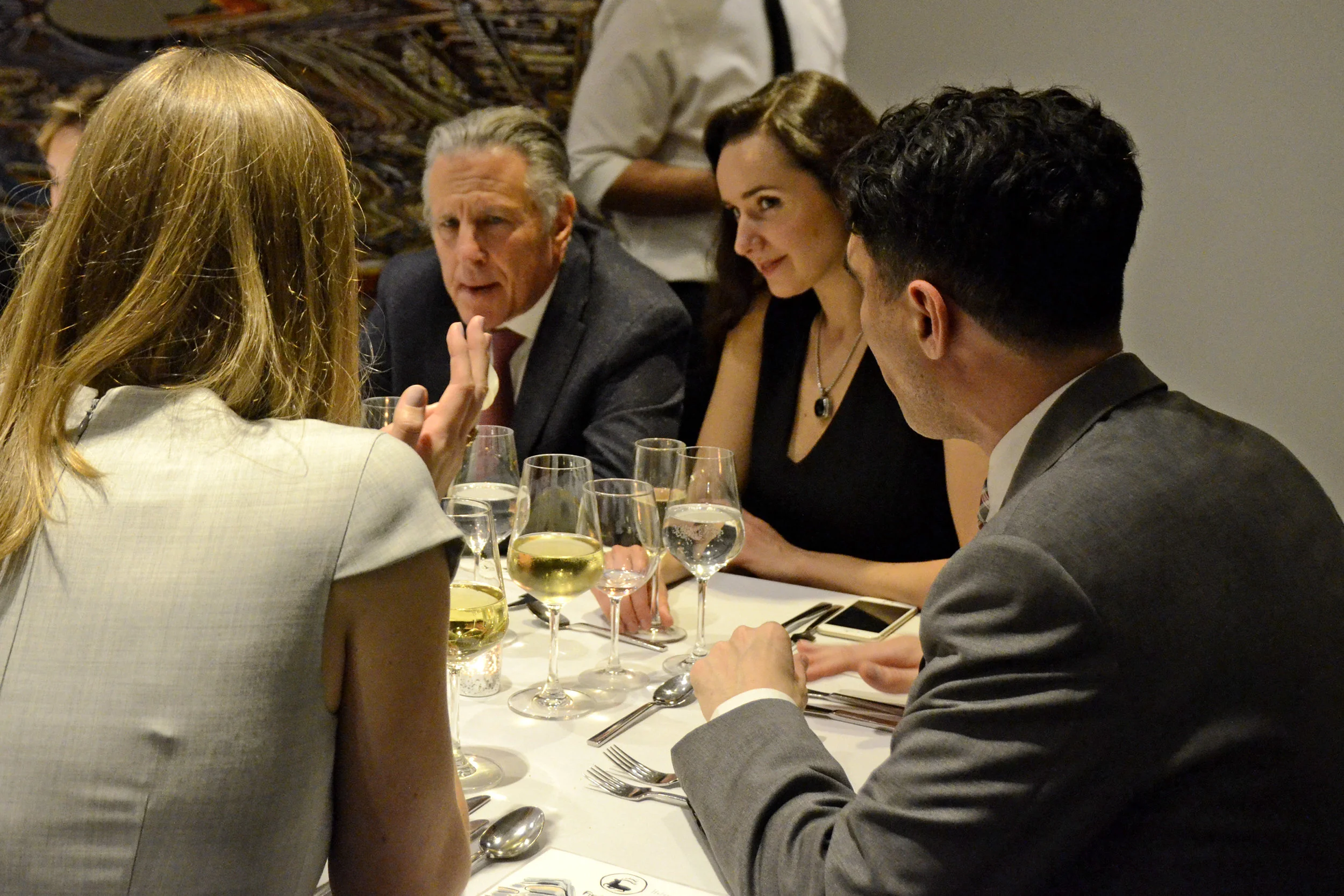Victory Club members and friends of Avenue magazine enjoying conversations and delicious food.