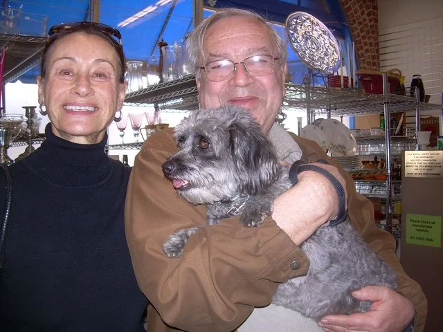 Couple in store with their dog