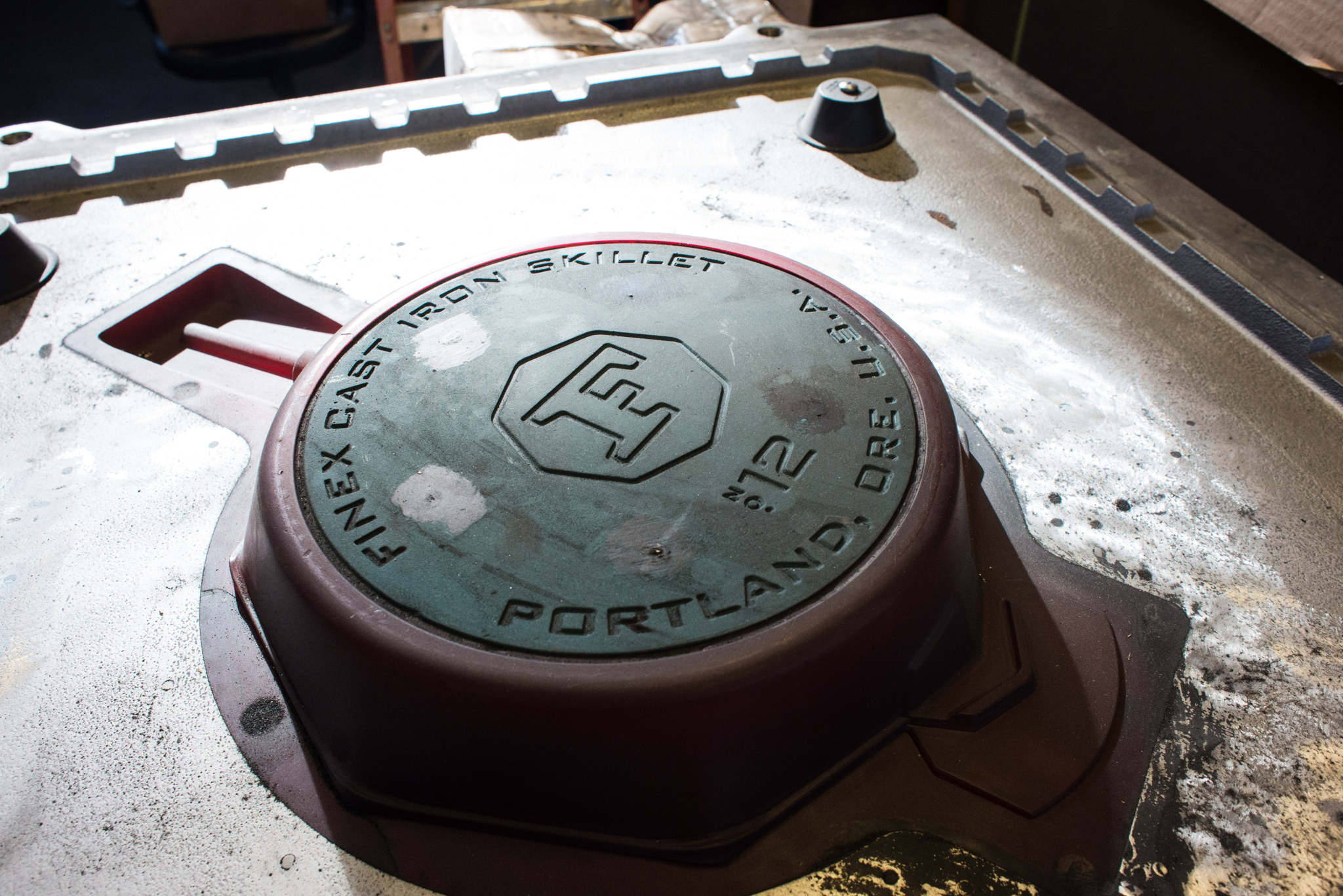 A freshly cast FINEX skillet still encased in the mold.