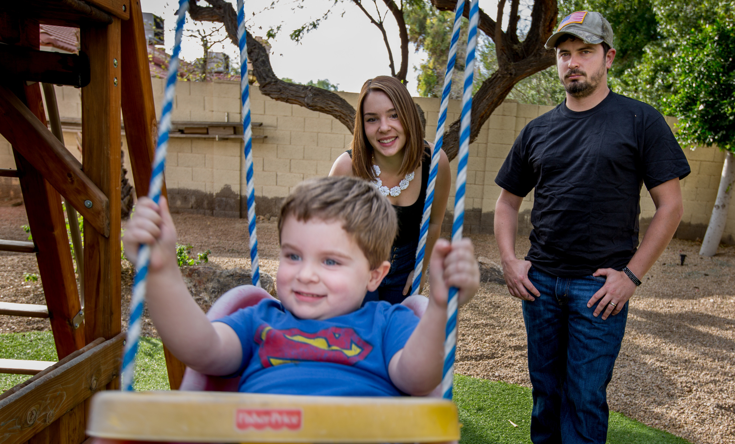  In a collaborative photograph, Josh Quigg creates an image that describes what it means to live with PTSD. He wants to be there for his family, but sometimes the PTSD pulls him back to Afghanistan.  (Photo by Kara Frame and Joshua Quigg) 