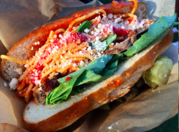 AQ Spaghetti Sloppy Joe Italian bread filled with spaghetti and marinara.