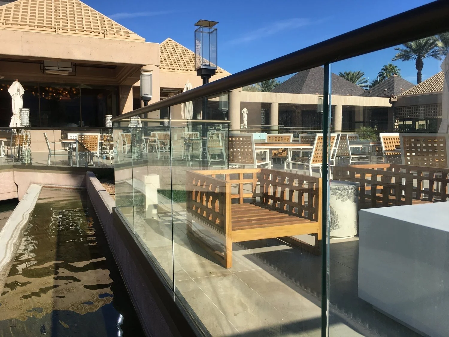 Why Hard Water Etches Glass in the Coachella Valley (And What Actually Fixes It)
