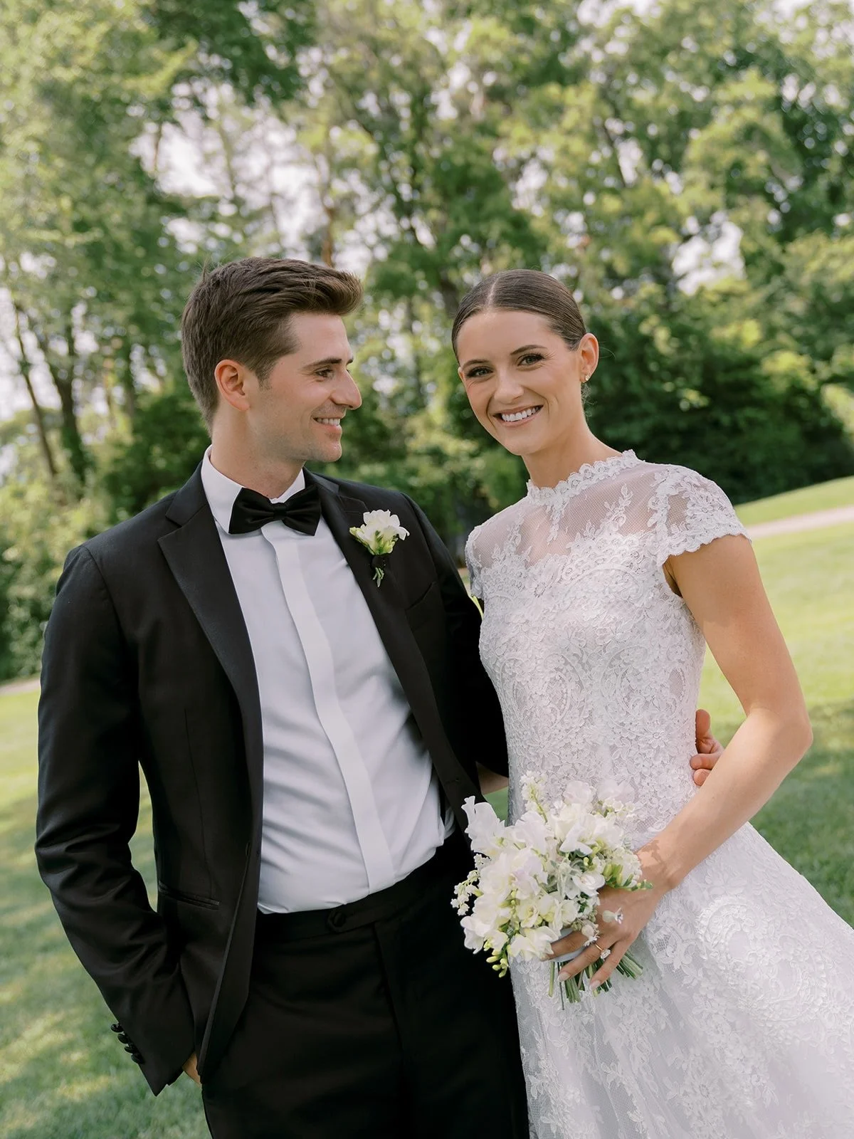 Isabel and Johnny🤍6.14.25
.
Featured in @minnesotabride 2026 Spring/Summer issue 
.
Isabel&rsquo;s requested, wired bouquet of fresh Sweet William, lily of the valley, dianthus, sweet peas, fresia and lisianthus was light as a feather and paired wel