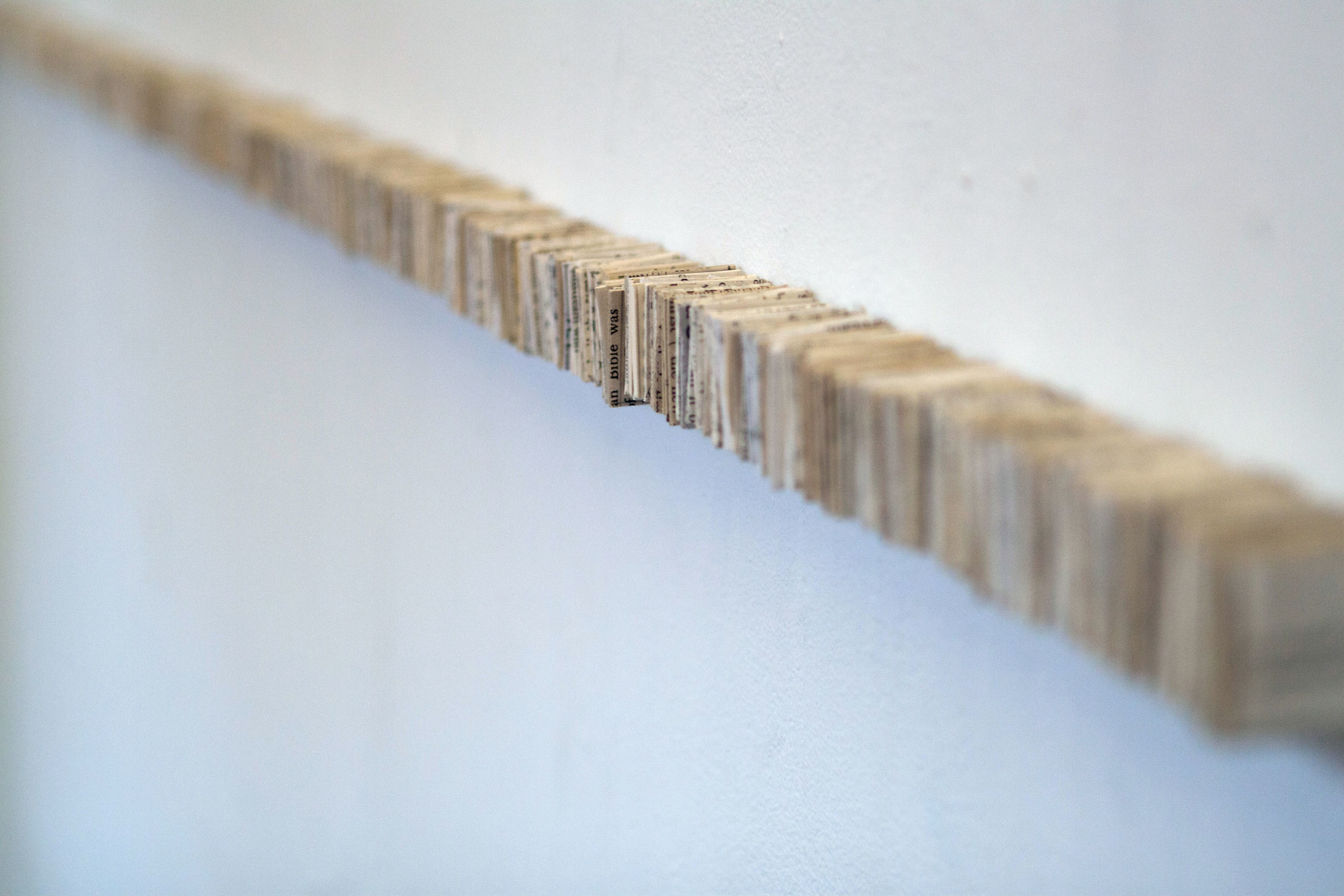 Sometimes, they’re right (detail) Book pages, glue Dimensions variable Installation at New York Center for Art and Media Studies 2011 Photo by Jessica Kohout