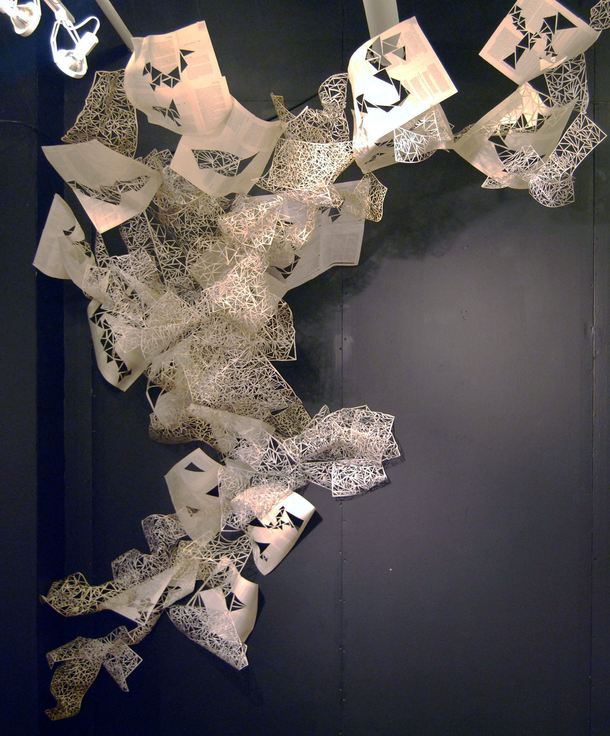 I’m fairly certain the future smells like laserz. Book pages, map pins Dimensions variable Installation at the Thorp Building, Minneapolis, MN 2012 Photo by Alex Stewart