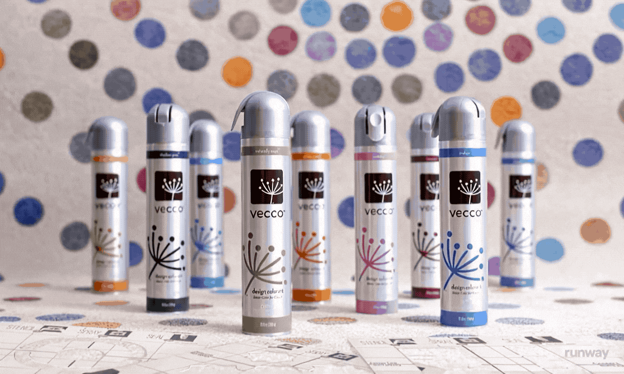 Several cans of Vecco dry erase markers with different colored caps arranged on a table with a sports court map, against a background decorated with colorful polka dots.