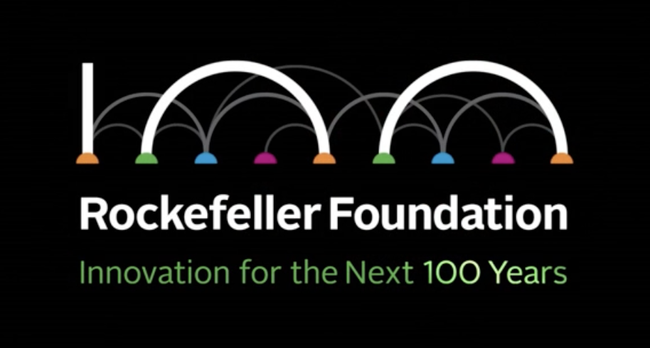 Stylized graphic with arches and small colored circles beneath each arch, text reads 'Rockefeller Foundation' in bold white, with a tagline 'Innovation for the Next 100 Years' in green.