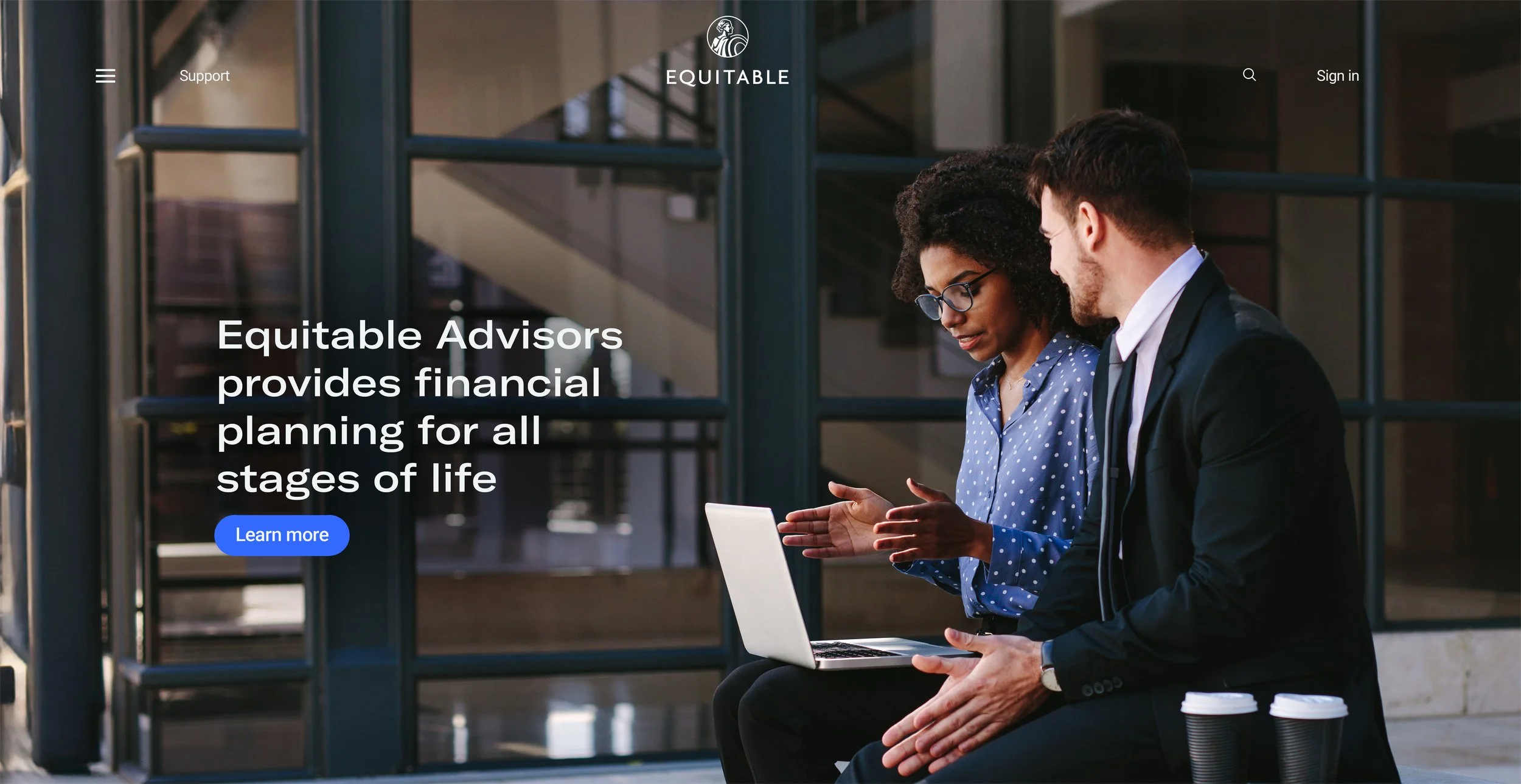 Two professionals, a woman and a man, sitting outside and discussing over a laptop, with coffee cups on the table. The website header shows the logo and navigation options for Equitable, a financial planning advisory service.