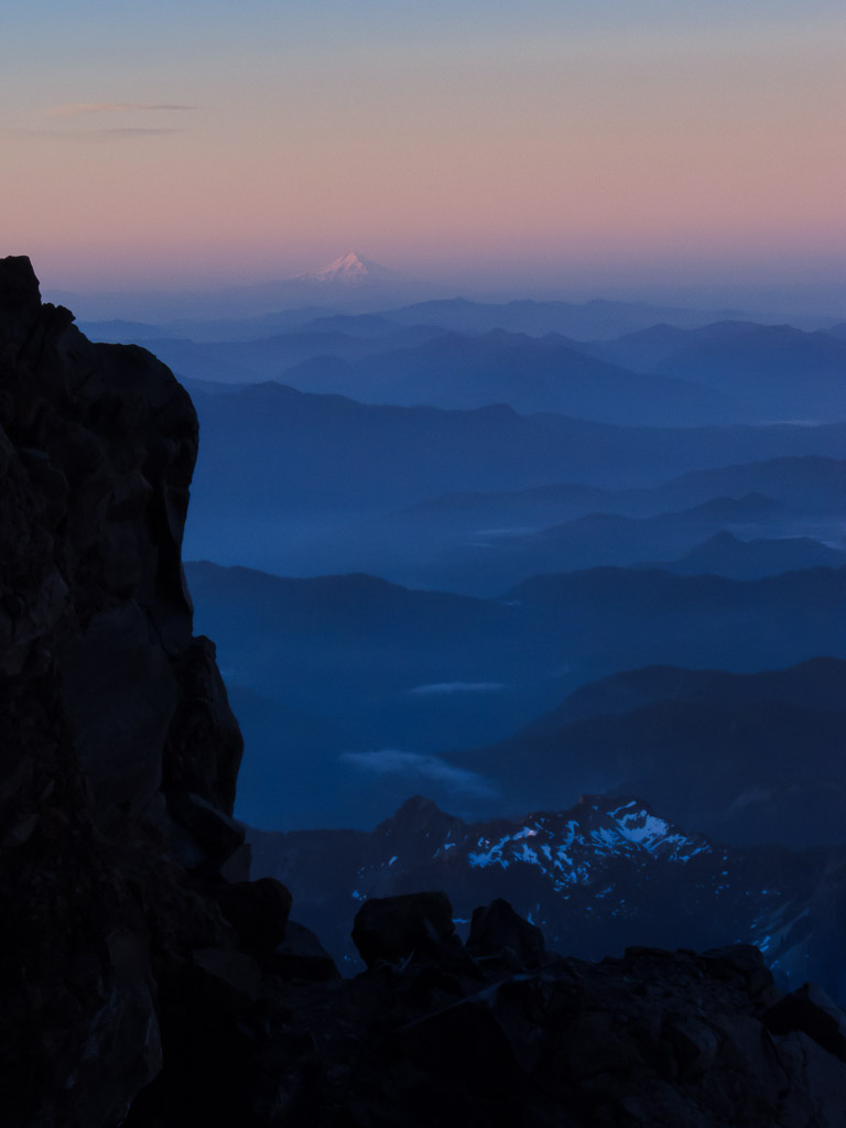 First light and alpenglow on Mt Hood and the valleys below