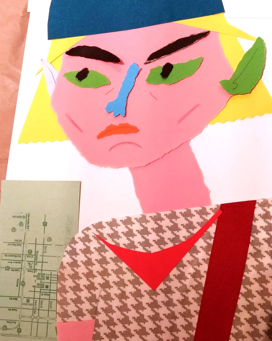 Green ear - pencil on ripped and cut paper. Personal experimentation.