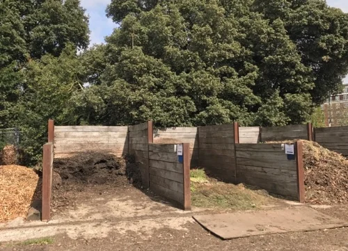 The garden ready compost is on the left, with garden waste next along