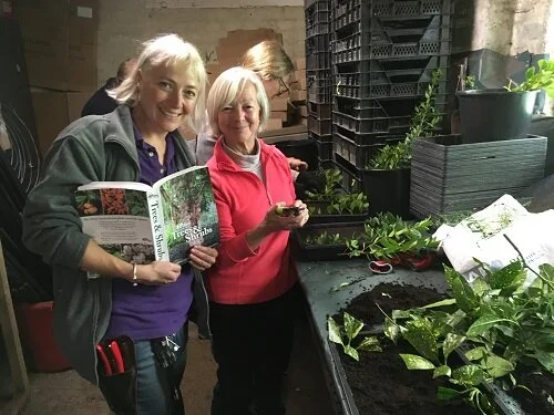 Head gardener Lucy with garden volunteer Isabel