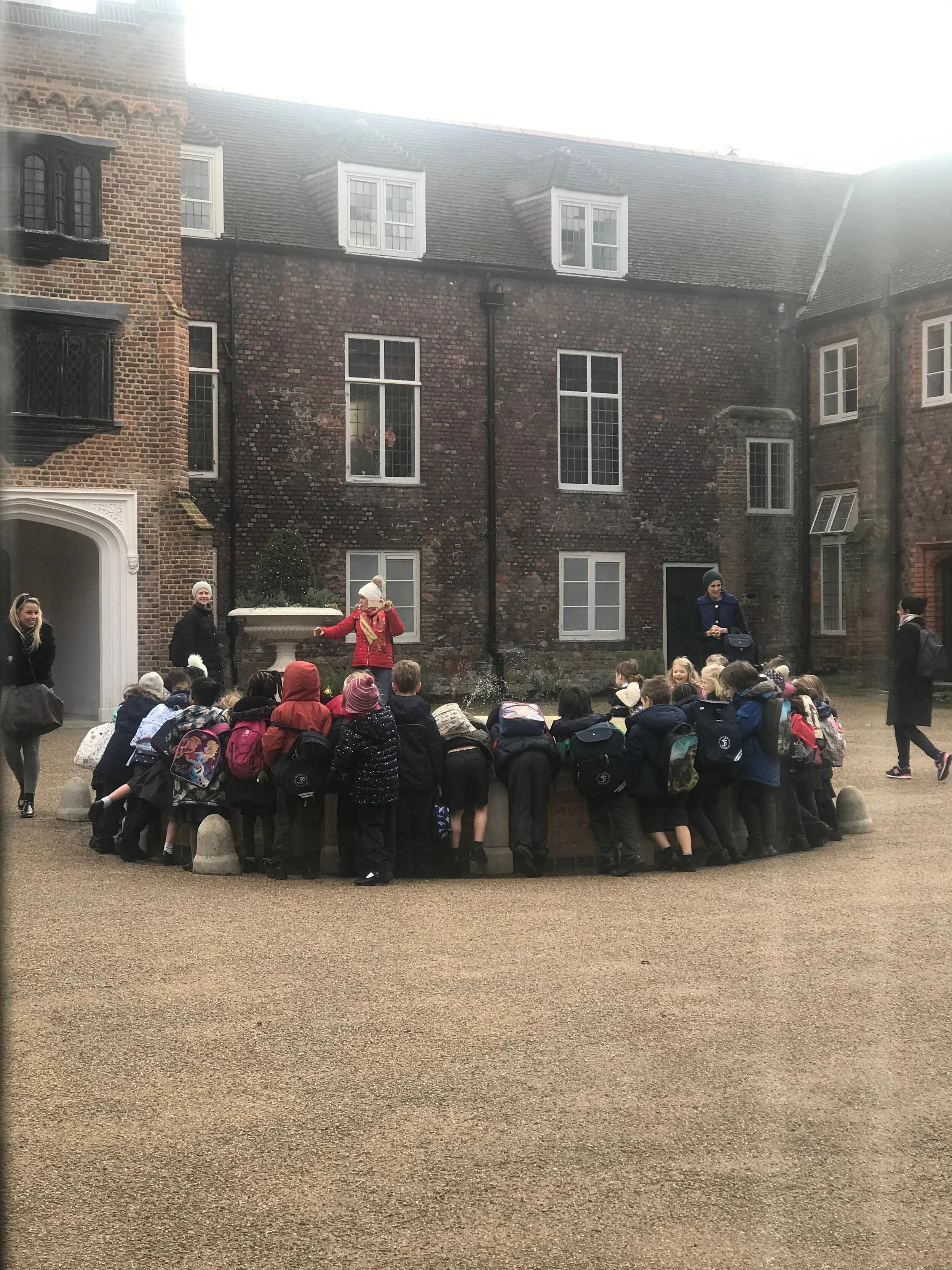 children around fountain.JPG