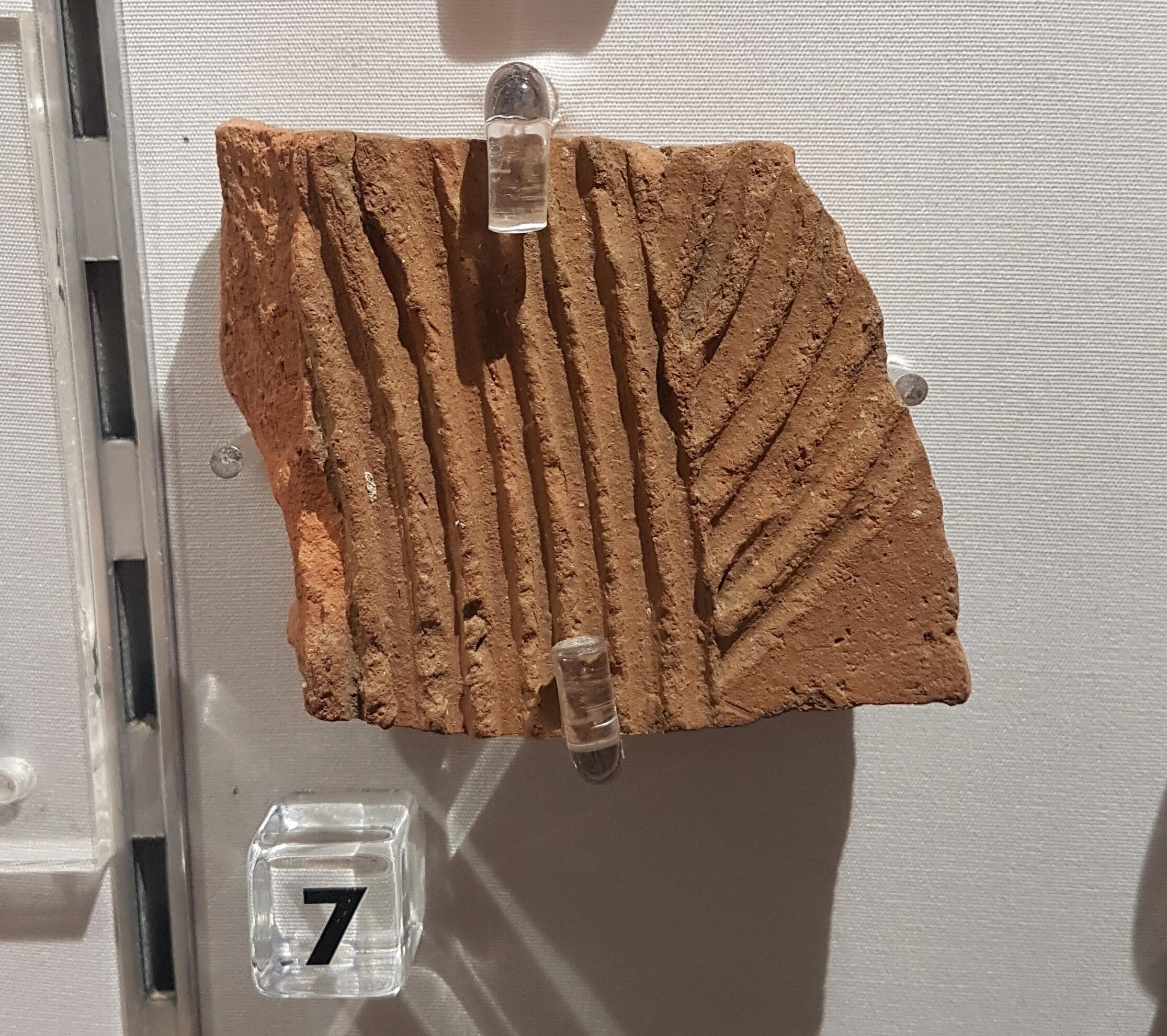 Tile, designed to circulate air within a Roman hypocaust (central heating system). Found during MTI archaeology dig (AD43-410)