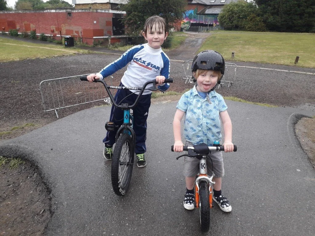 Me and my brother at the pump track (I'm wearing my dad's old BMX top from the 1980’s!)