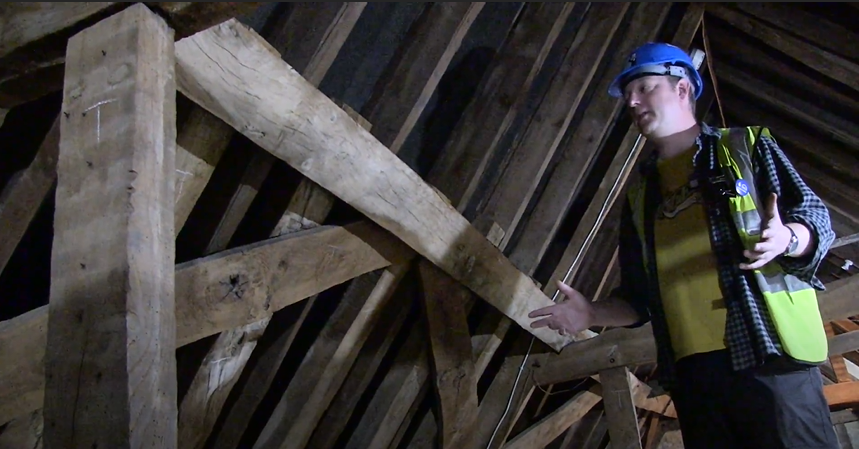 Alexis in the Tudor roof space above the Great Hall.