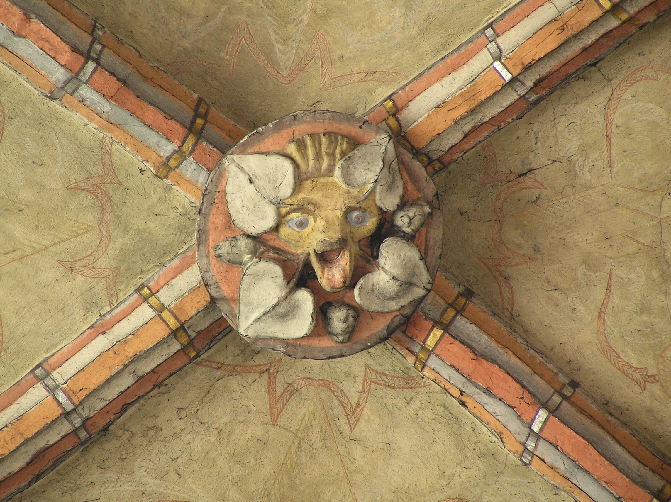 An example of a rib vault keystone with boss, in the Church of St Mary in Chełmno, Poland (source: Wikipedia).