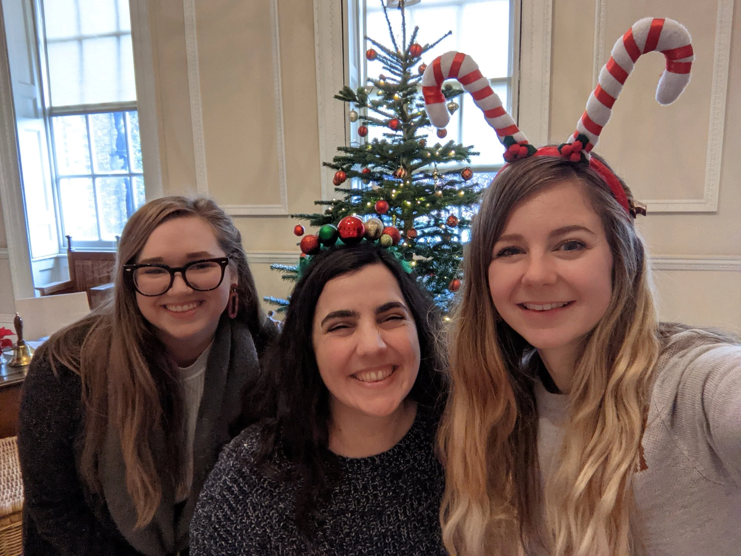 Erin, Claudia and Rachel with Christmas tree.jpg