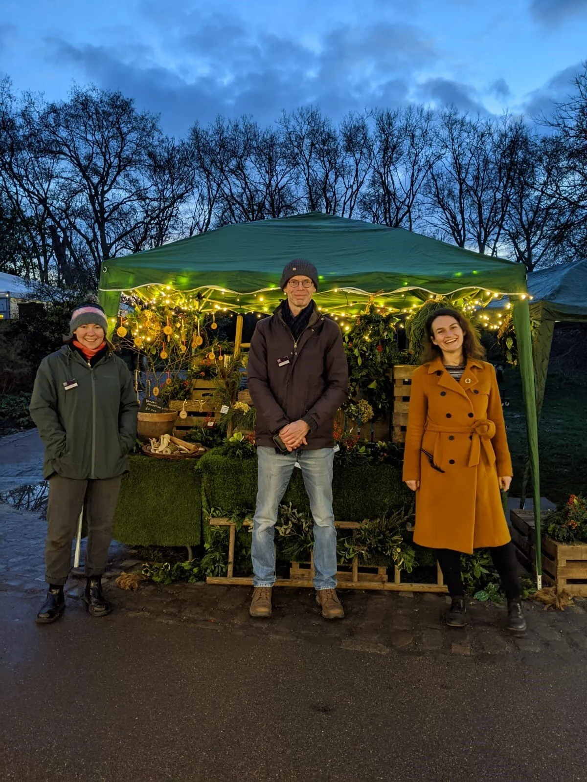 Millie, Howard and Nicola by the garden stall.jpg