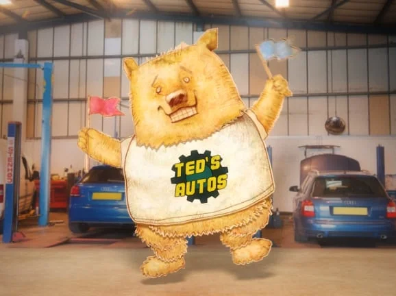 dancing bear in an auto shop