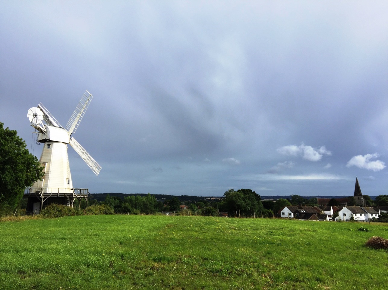 Woodchurch’s windmill and church Photo Credit: C Musangi AIA