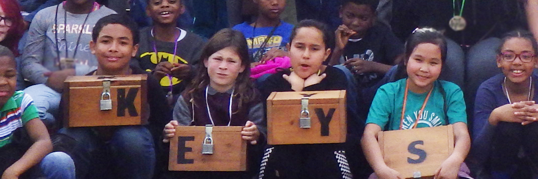 This will be a newer, clearer picture of children holding the key boxes.
