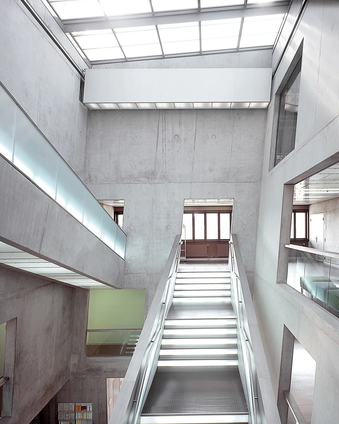 A Shot from and architectural photography journey I took through Netherlands and Germany quite some time ago. This is the Stadthaus Scharnhauser Park, Ostfildern, Germany. Amazing building, loved the angles although it was hard accepting that everyth