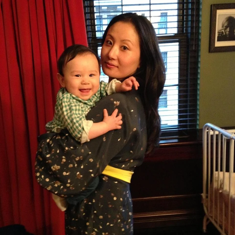 Kyung Lee wearing the Anna Kimono with her son Jones.