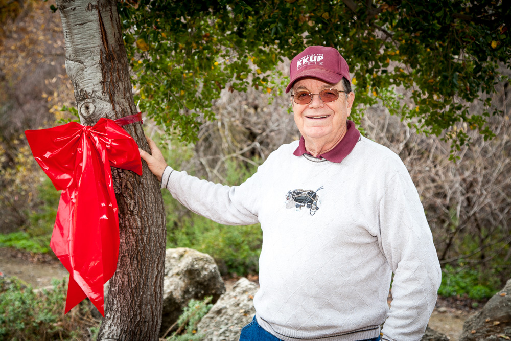 Pat with one of the oak trees for which he has proudly cared for nearly 23 years.