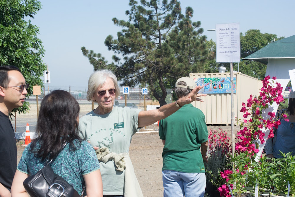 Carol Arnoldy talking to residents at the Community Nursery.