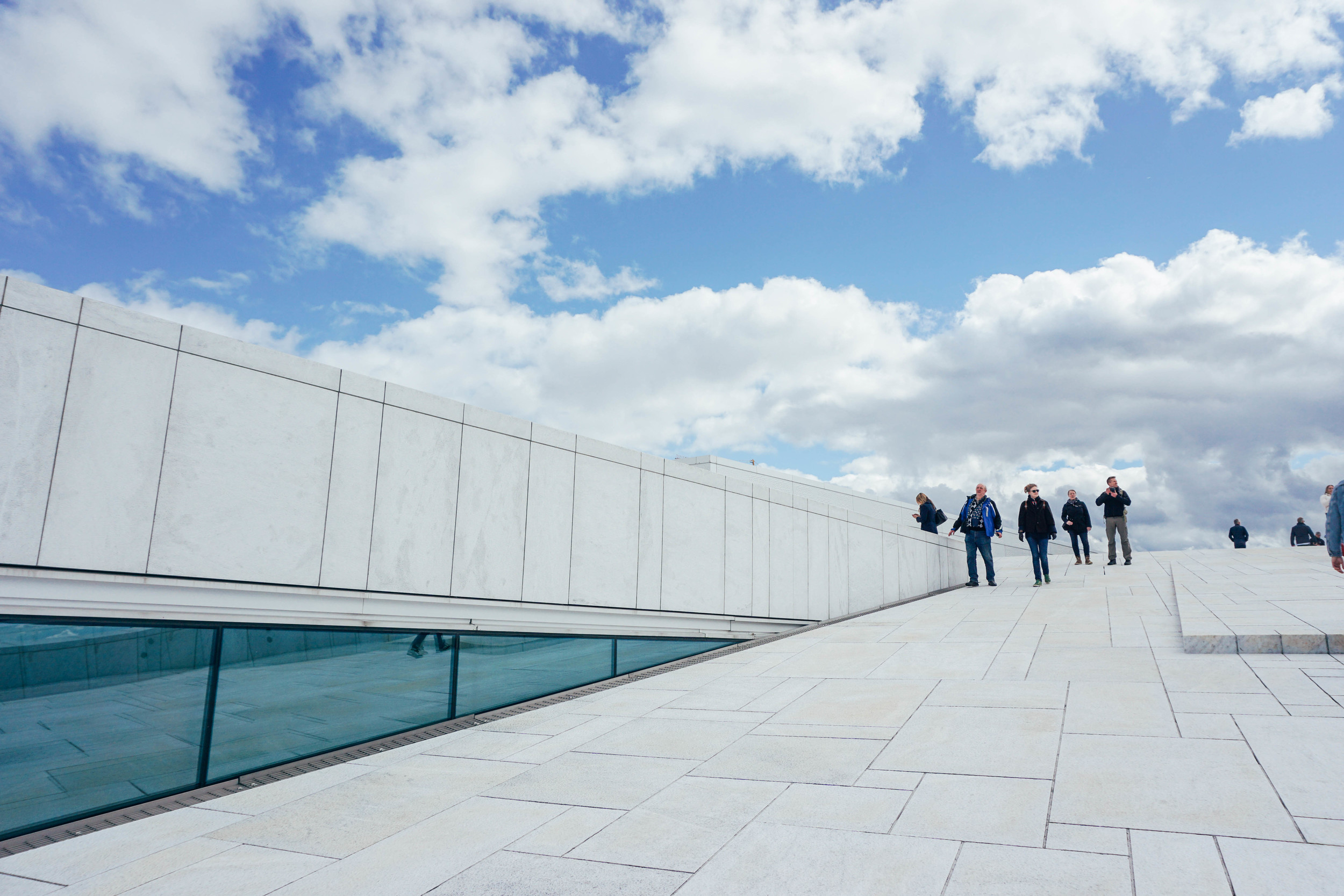 Walk along the building and roof of the ultra modern Oslo Opera House.