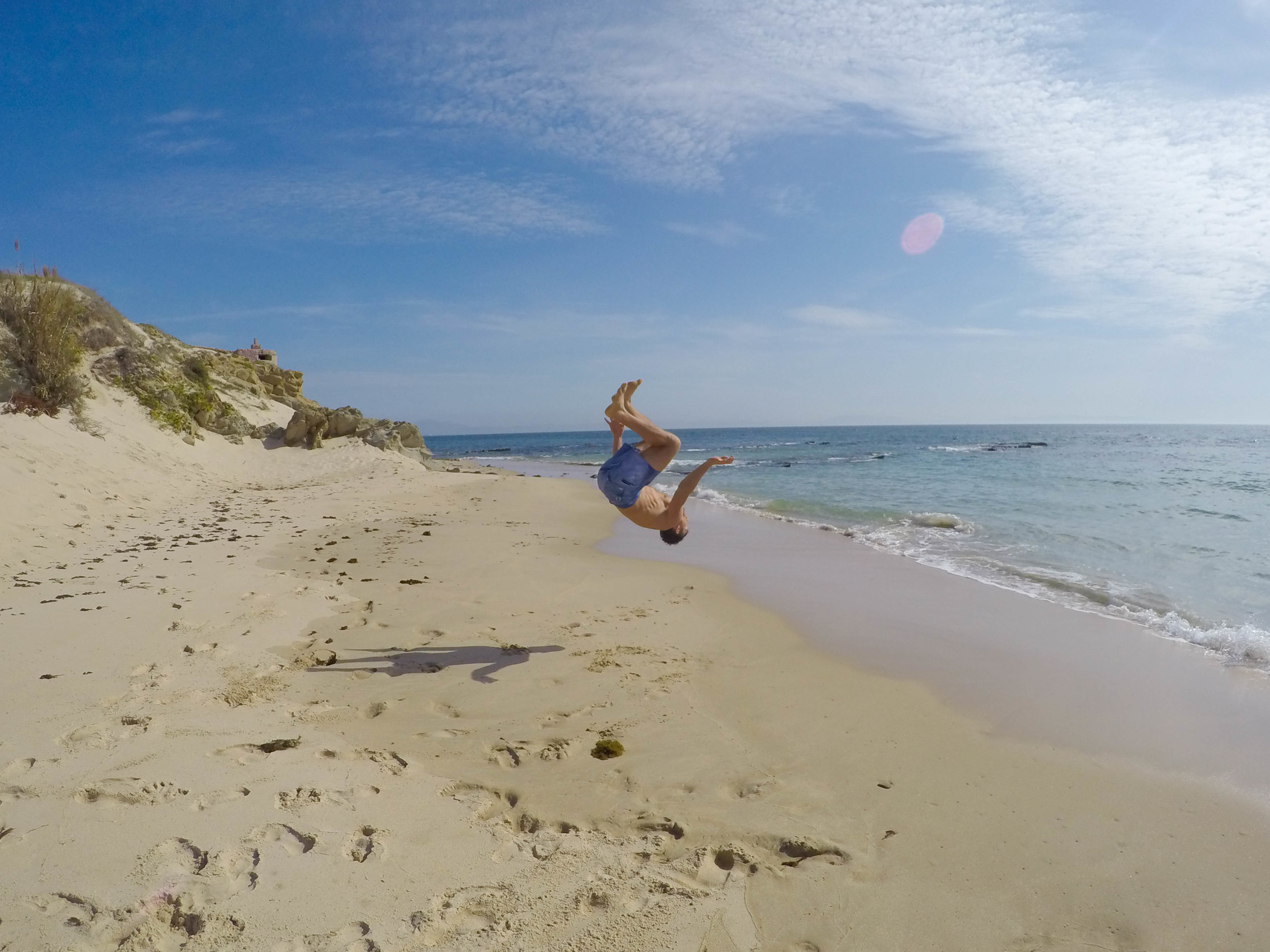 Flips in the sand in Tarifa.