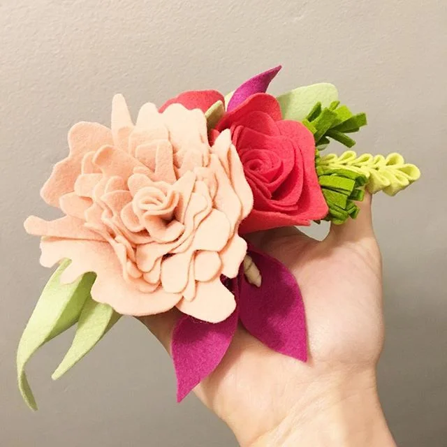You guys: Is this felt peony working? Does it look like weird pink fungus?! Ive been felting for way too long and I can't see straight...... πMore at @entwinebridal #experimenting #hairpiece #bridalhairpiece #bridalaccessory #flowercrown #feltflower