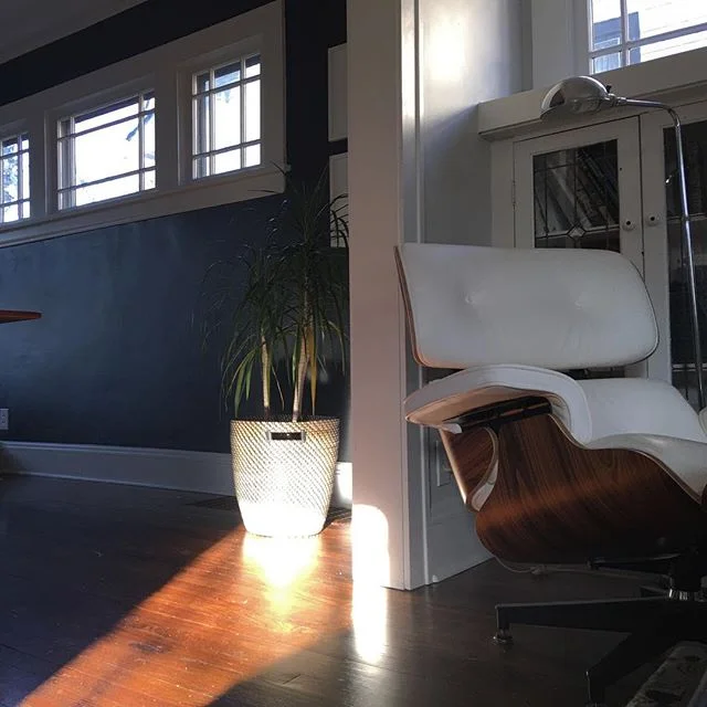 Folding laundry in a little bit of winter sun like ππ»π #modernhome #americanfoursquare #moderncraftsman #eames #hygge