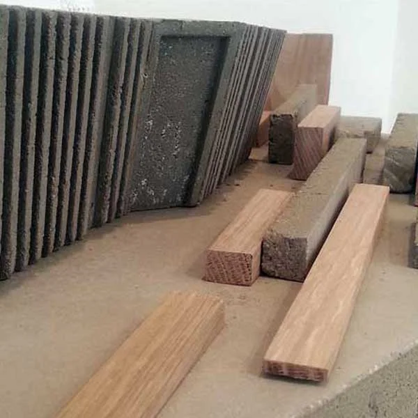 Model-making with concrete moulds and oak pieces.