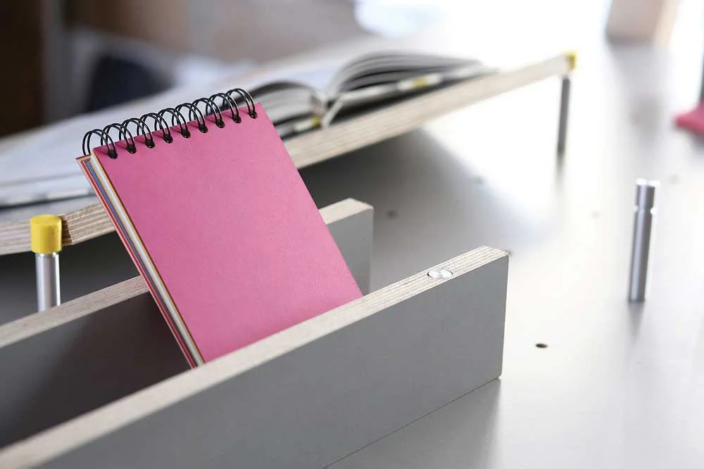 Prototypes of flexible desktop storage system from CNC plywood, milled aluminium pegs, and 3D printed joining pieces.